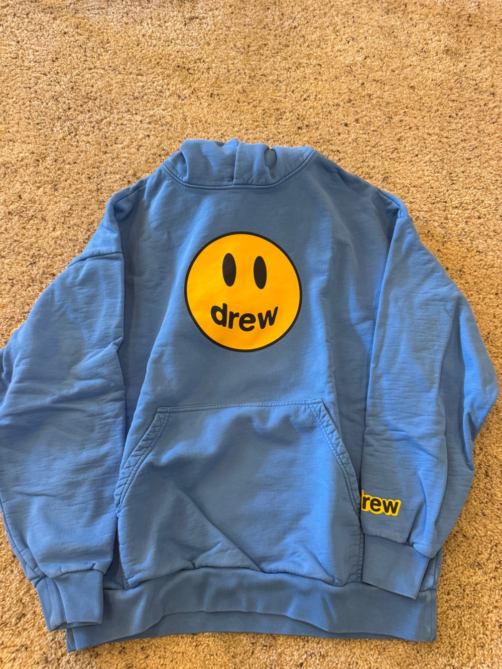 drew house light blue pullover with yellow logo tag